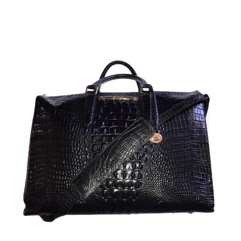 2 piece—-Brahmin weekender (used a couple time) and makeup bag (brand new)